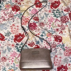 Elegant Rose Gold Crossbody Bag with Structured Design